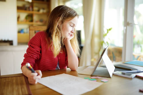 clever girl working at home